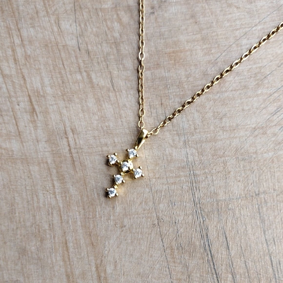 Anthropologie Jewelry - Elegant Gold Cross Pendant Necklace